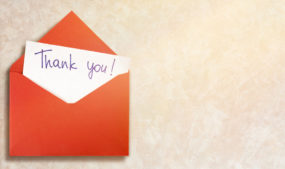 Envelope with a thank you note.